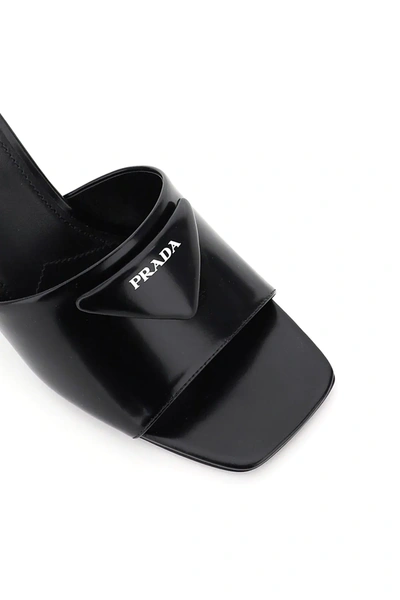 Shop Prada Triangle Logo Mules In Black