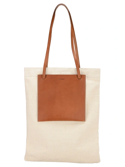 Shop Jil Sander Pocket Flat Shoulder Bag In Off White