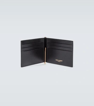 Shop Saint Laurent Portadoll Leather Money Clip Wallet In Black