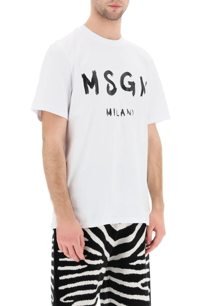 Shop Msgm Paint Brushed Logo T-shirt In White,black