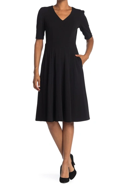 Shop Donna Morgan V-neck Fit & Flare Dress In Black
