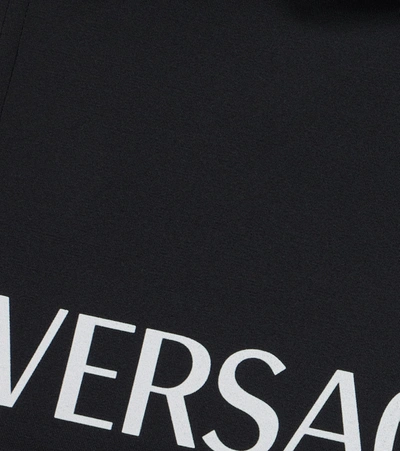 Shop Versace Logo Technical Shorts In Black