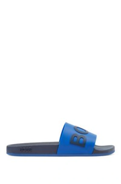 Shop Hugo Boss - Logo Slides With Monogram Embossed Outsole - Light Blue
