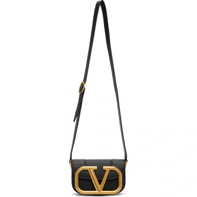 Shop Valentino Black  Garavani Small Super Vlogo Crossbody Bag In 0no Black