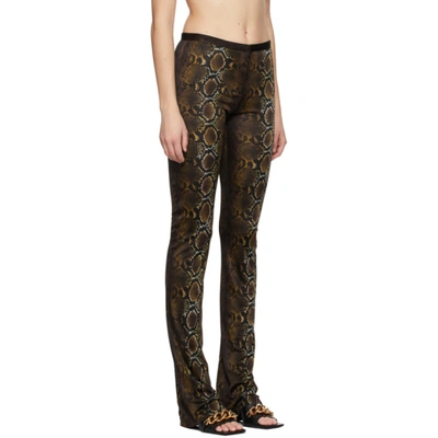 Shop Versace Brown Python Print Trousers In 5n020 Brown