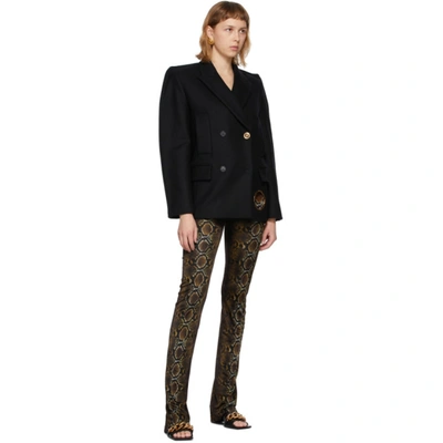 Shop Versace Brown Python Print Trousers In 5n020 Brown