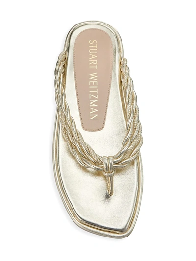Shop Stuart Weitzman Calypso Metallic Leather Flat Thong Sandals In Gold