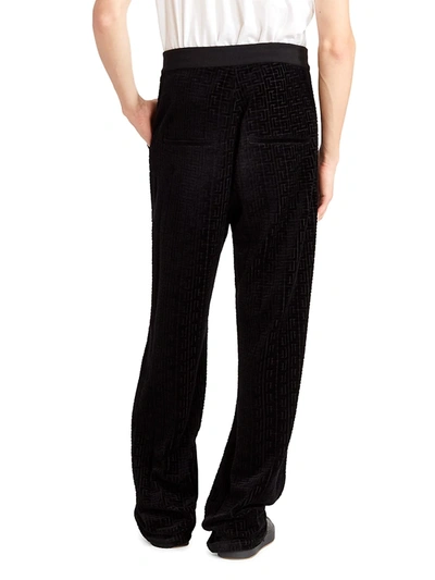 Shop Balmain Monogram Velvet Sweatpants In Noir