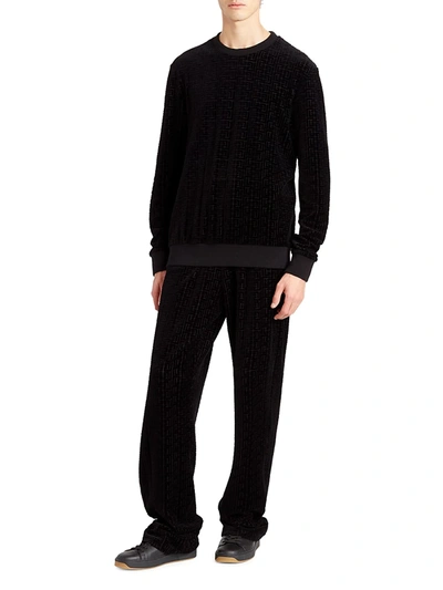 Shop Balmain Monogram Velvet Sweatpants In Noir