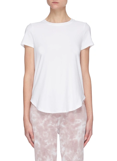 Shop Beyond Yoga 'on The Down Low' Curve Hem T-shirt In White