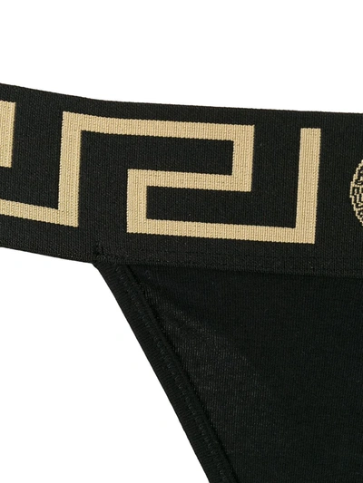 Versace Greca Jacquard-trimmed Stretch-cotton Jersey Thong In Black