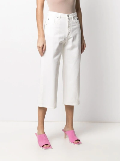 Msgm Logo-print Cropped Jeans In Neutrals