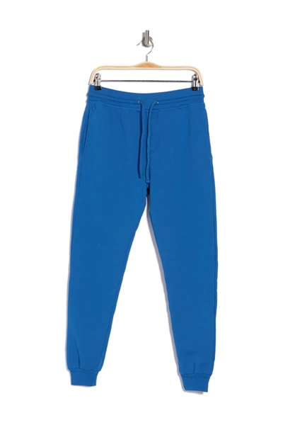 Shop Goodlife Terry Cloth Joggers In Strong Blue