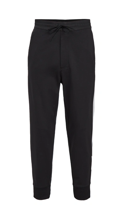 Shop Y-3 3 Stripe Cuffed Track Pants In Black