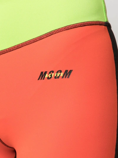 Shop Msgm Colour Block Logo Print Leggings In Orange