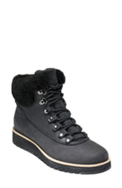 Shop Cole Haan Grandexplore Genuine Shearling Trim Waterproof Hiker Boot In Black Leather