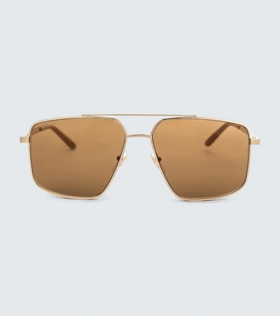 Shop Gucci Metal Aviator Sunglasses In Gold