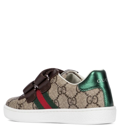 Shop Gucci Ace Gg Supreme Canvas Sneakers In Brown