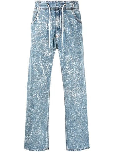 Shop Msgm Acid-wash Wide-leg Jeans In Blue