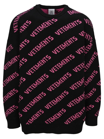 Shop Vetements All Over Logo Knitted Jumper In Black Pink