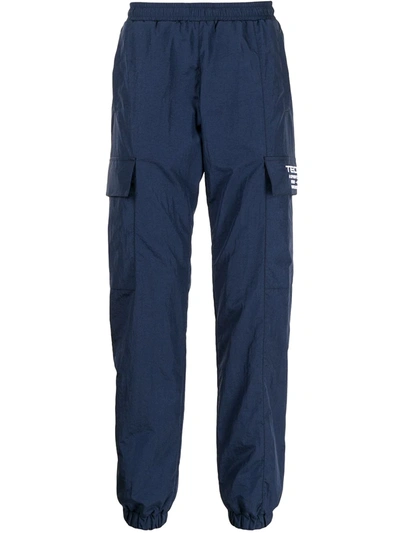 Shop Misbhv Tecn Embroidery Track Pants In Blue