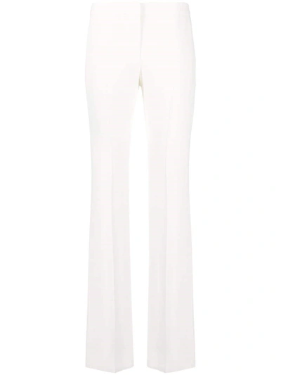 Shop Alexander Mcqueen Pantaloni In White