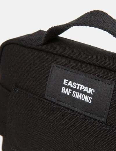 Shop Eastpak X Raf Simons Waistband Loop Hip Bag In Black