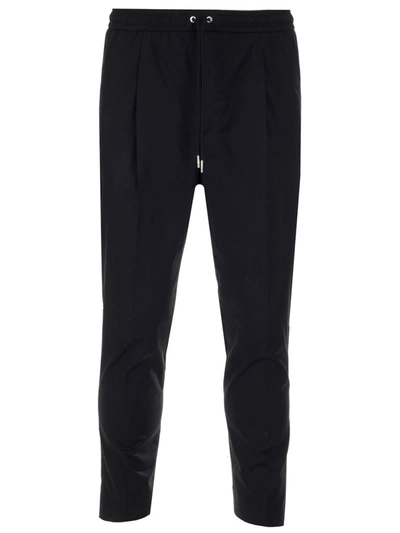 Shop Moncler Drawstring Tapered Pants In Black