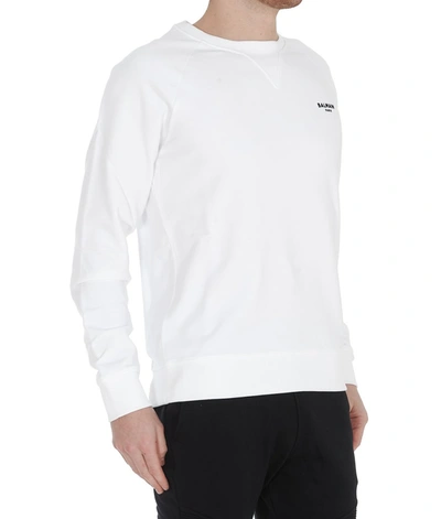 Shop Balmain Flocked Logo Crewneck Sweatshirt In White