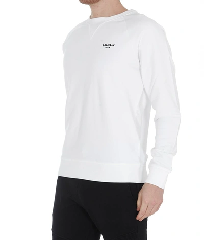 Shop Balmain Flocked Logo Crewneck Sweatshirt In White