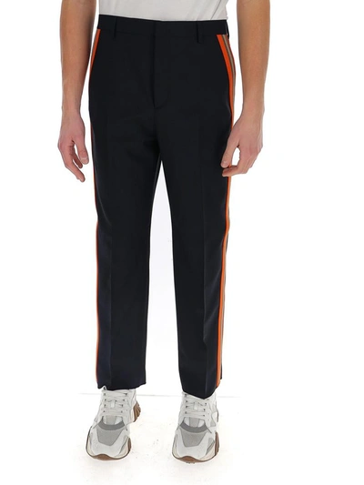 Shop Valentino Side Stripe Trousers In Navy