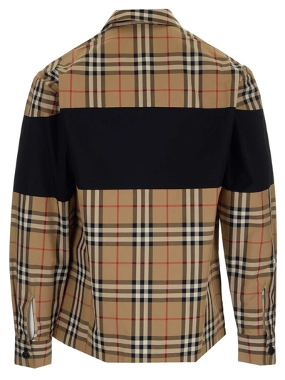Shop Burberry Contrast Panel Check Zipped Shirt In Beige
