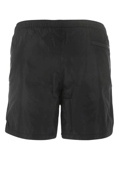 Shop Valentino Logo Detail Swim Shorts In Black