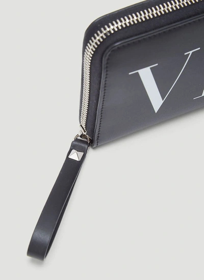 Shop Valentino Vltn Zip Around Continental Wallet In Black