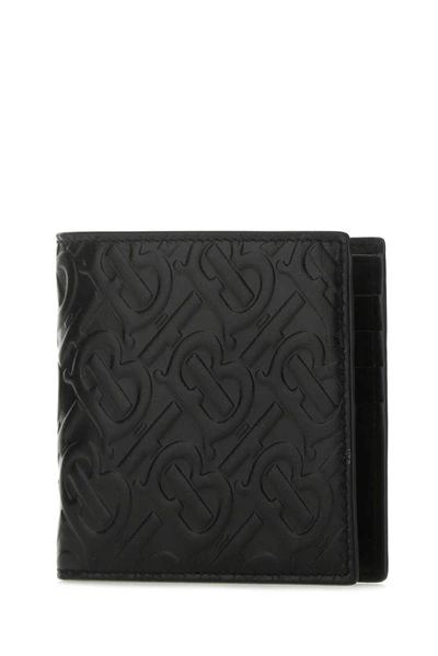 Shop Burberry Monogram Embossed Bifold Wallet In Black