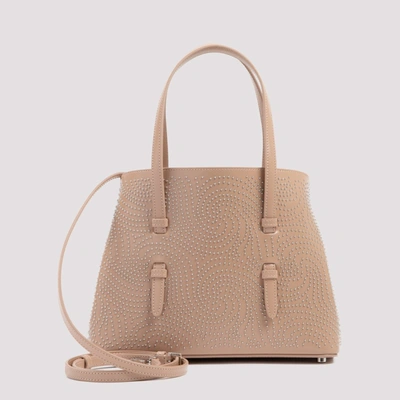 Shop Alaïa Mina 25 Studded Top Handle Bag In Beige