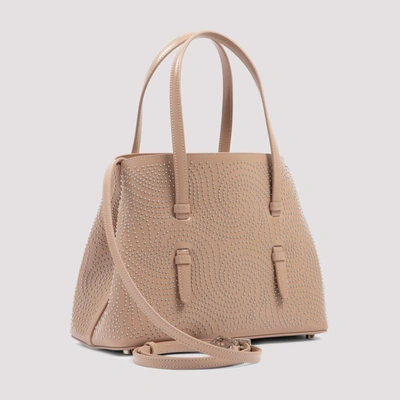 Shop Alaïa Mina 25 Studded Top Handle Bag In Beige