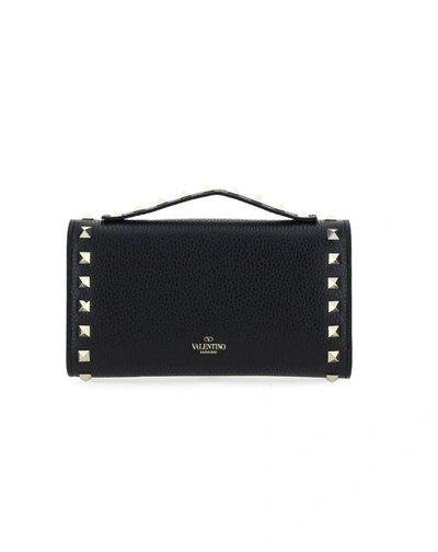 Shop Valentino Garavani Rockstud Chain Wallet In Black