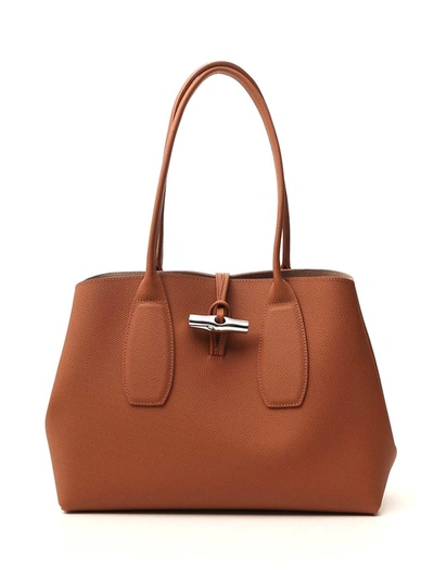 Shop Longchamp Roseau Shoulder Bag In Brown