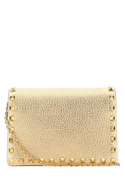 Shop Valentino Garavani Rockstud Chain Pouch In Gold