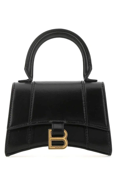 Shop Balenciaga Mini Hourglass Top Handle Bag In Black