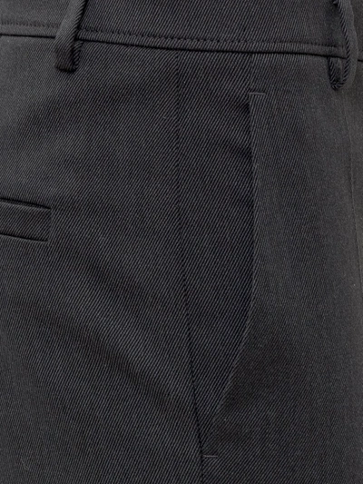 Shop Brunello Cucinelli Slim Leg Trousers In Black