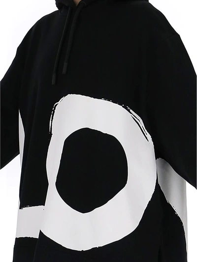 Shop Burberry Love Print Oversized Hoodie In Black