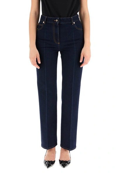 Shop Valentino Logo Patch Bootcut Jeans In Blue