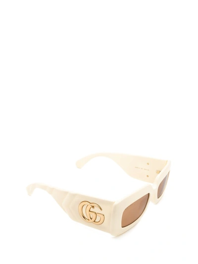 Shop Gucci Eyewear Rectangular Frame Sunglasses In Beige