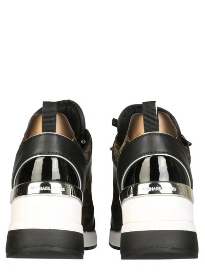 Shop Michael Michael Kors Georgie Wedge Sneakers In Multi