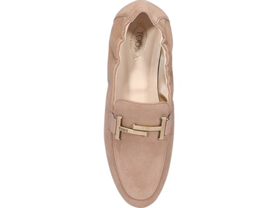 Shop Tod's Double T Logo Embellished Loafers In Beige