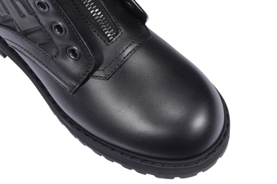 Shop Fendi Ff Motif Embossed Boots In Black