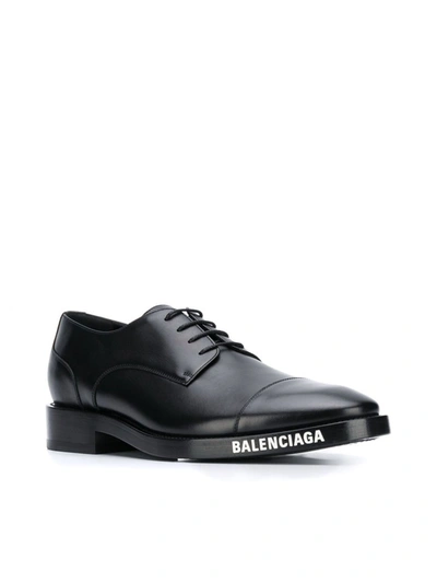 Shop Balenciaga Logo Detailed Derby Shoes In Black