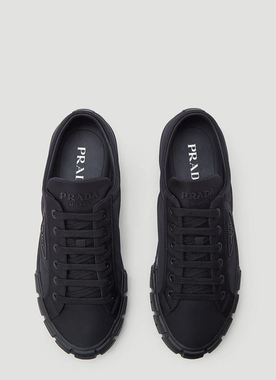 Shop Prada Wheel Cassetta Sneakers In Black